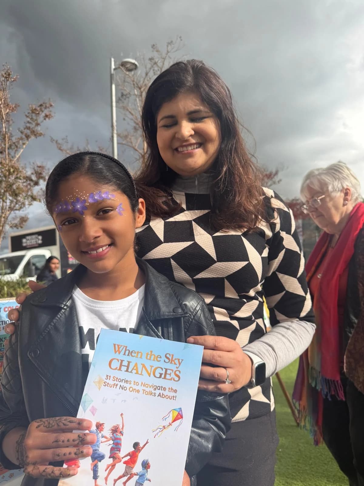 A young reader with When the Sky Changes